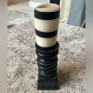 Black candle holder with black striped candle